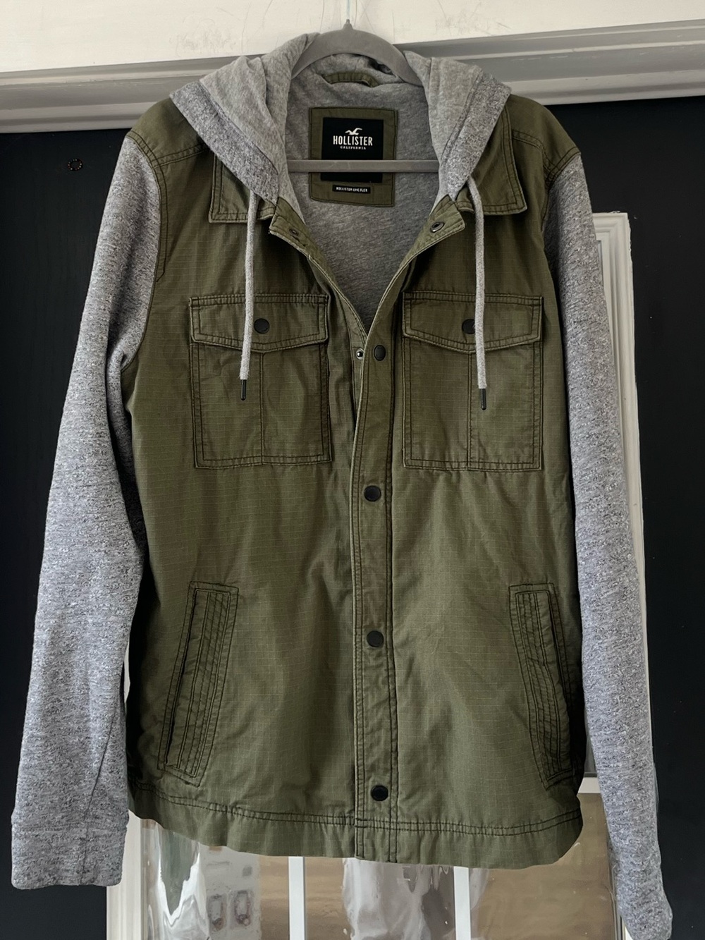 olive green Hollister utility jacket, built-in gray jersey hoodie
